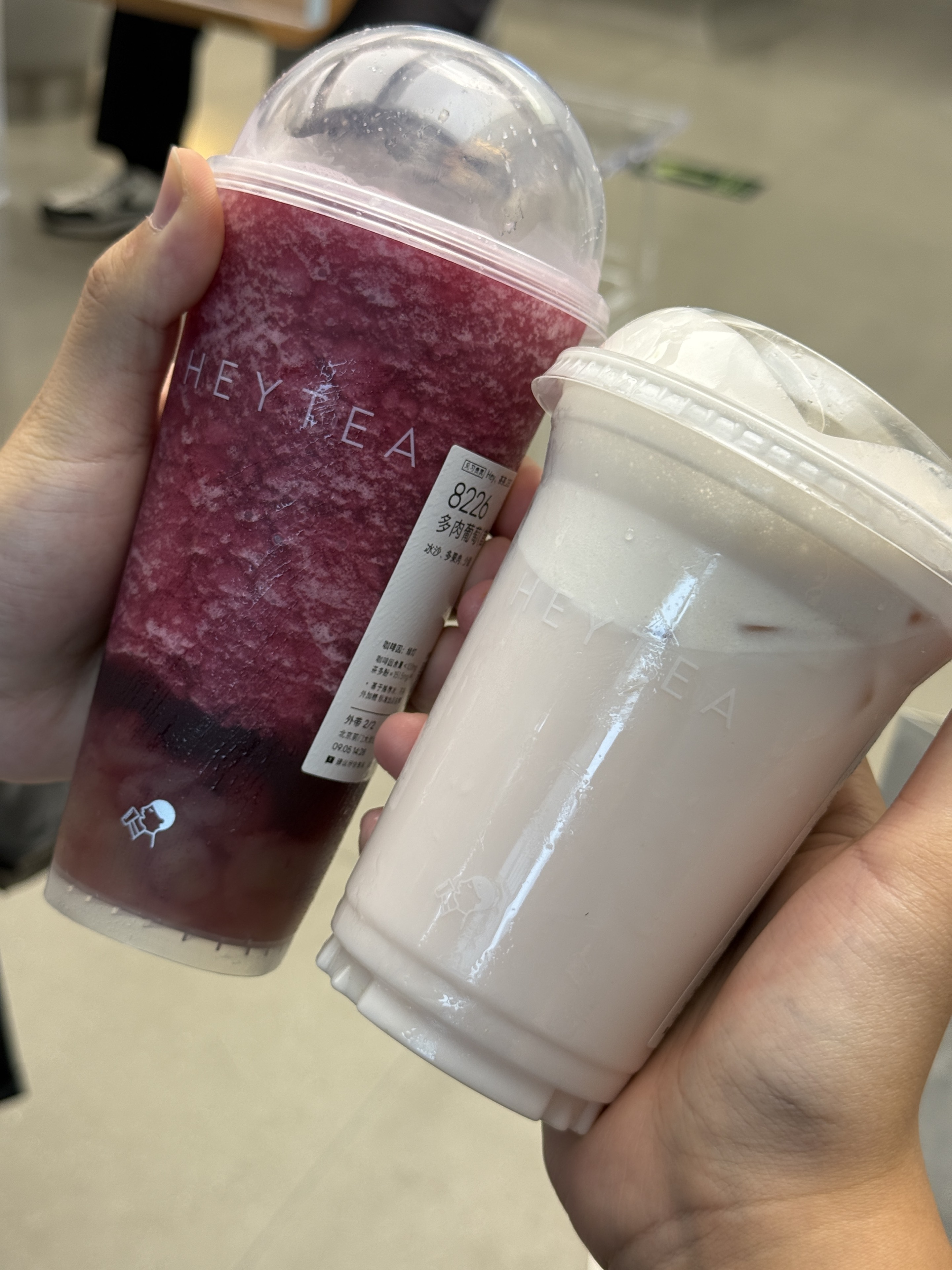 Two cups of HEYTEA during the trip.